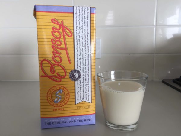 soy milk package and glass of soy